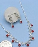 "Ruby" CZ necklace and earring set.