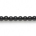 6mm (.24") round black opaque India beads.